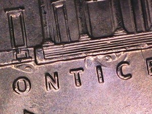 2023 Jefferson nickel die clash error showing faint ghost impression of reverse design on the obverse field